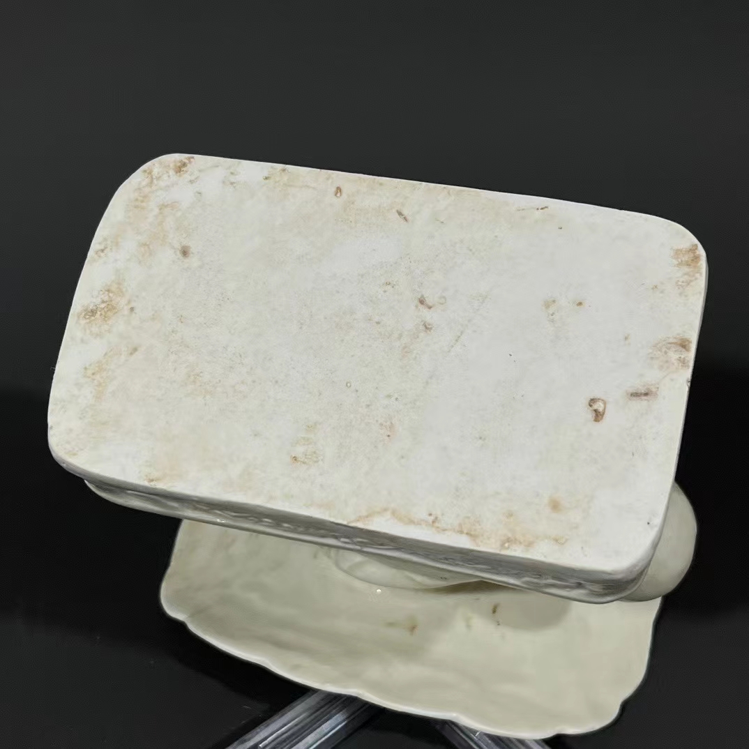 定窑孩儿荷叶枕精品鉴赏