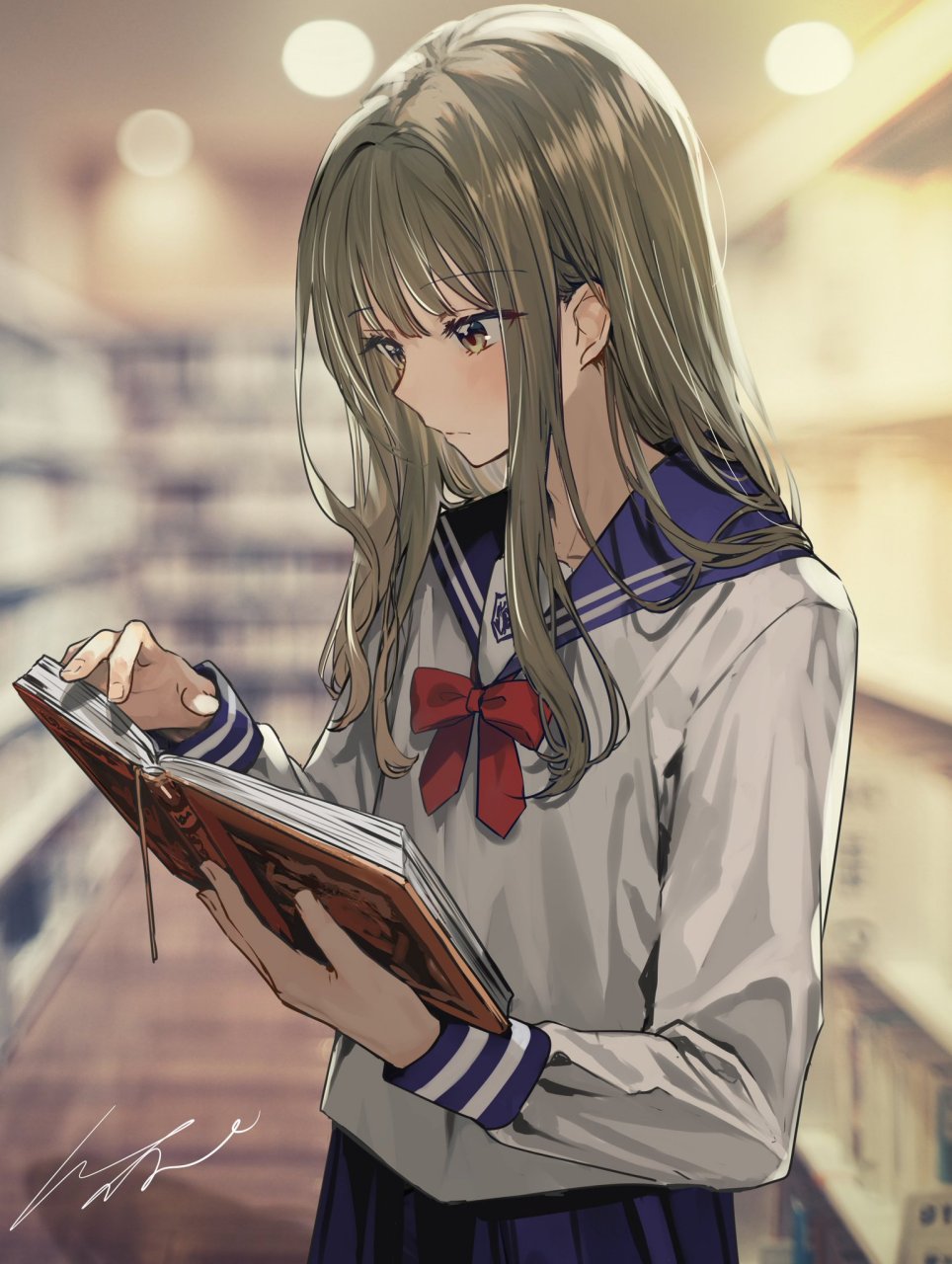 在图书馆看书的水手服少女