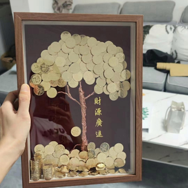 这是自己花了两天时间用铜丝和硬币做成的发财树,刚做好之后看着真的