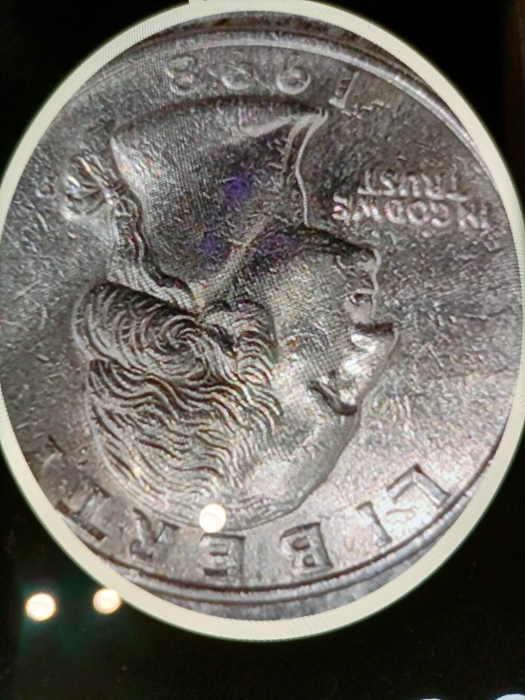 放大镜下  一组美元1元硬币