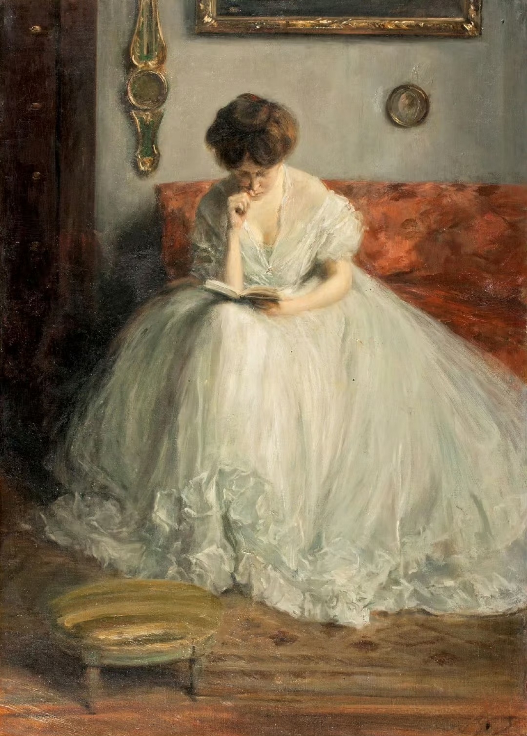 上专注看书的场景,画家通过细腻的色彩运用和独特的光幼撤⒂突 人物