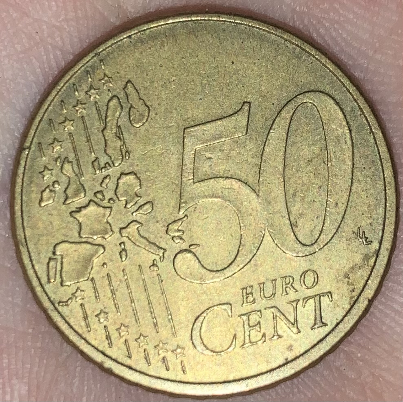 这个50元硬币是真的还是假的