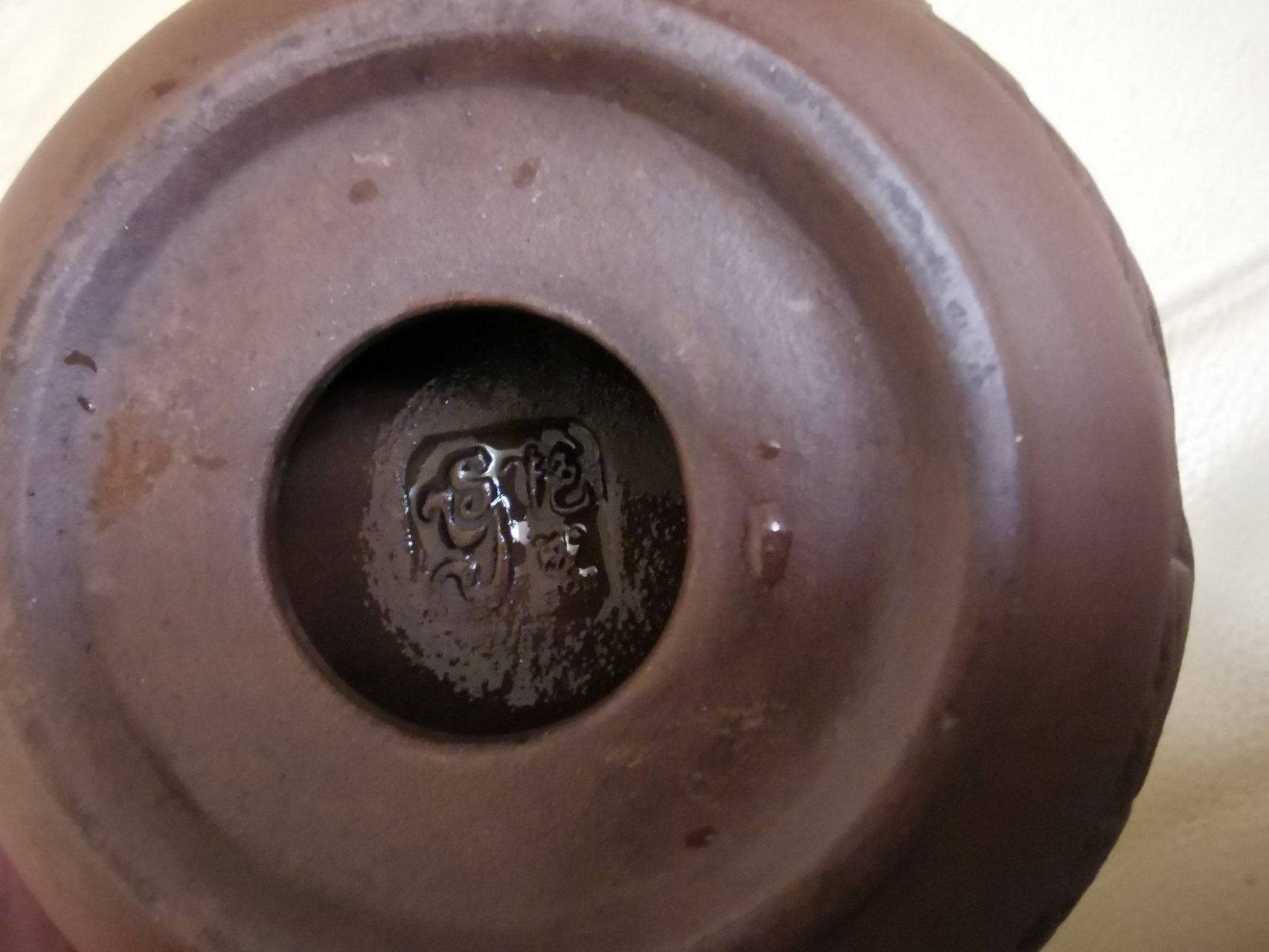 艳盛紫砂壶,很长时间了,请大家评价一下,是否真品