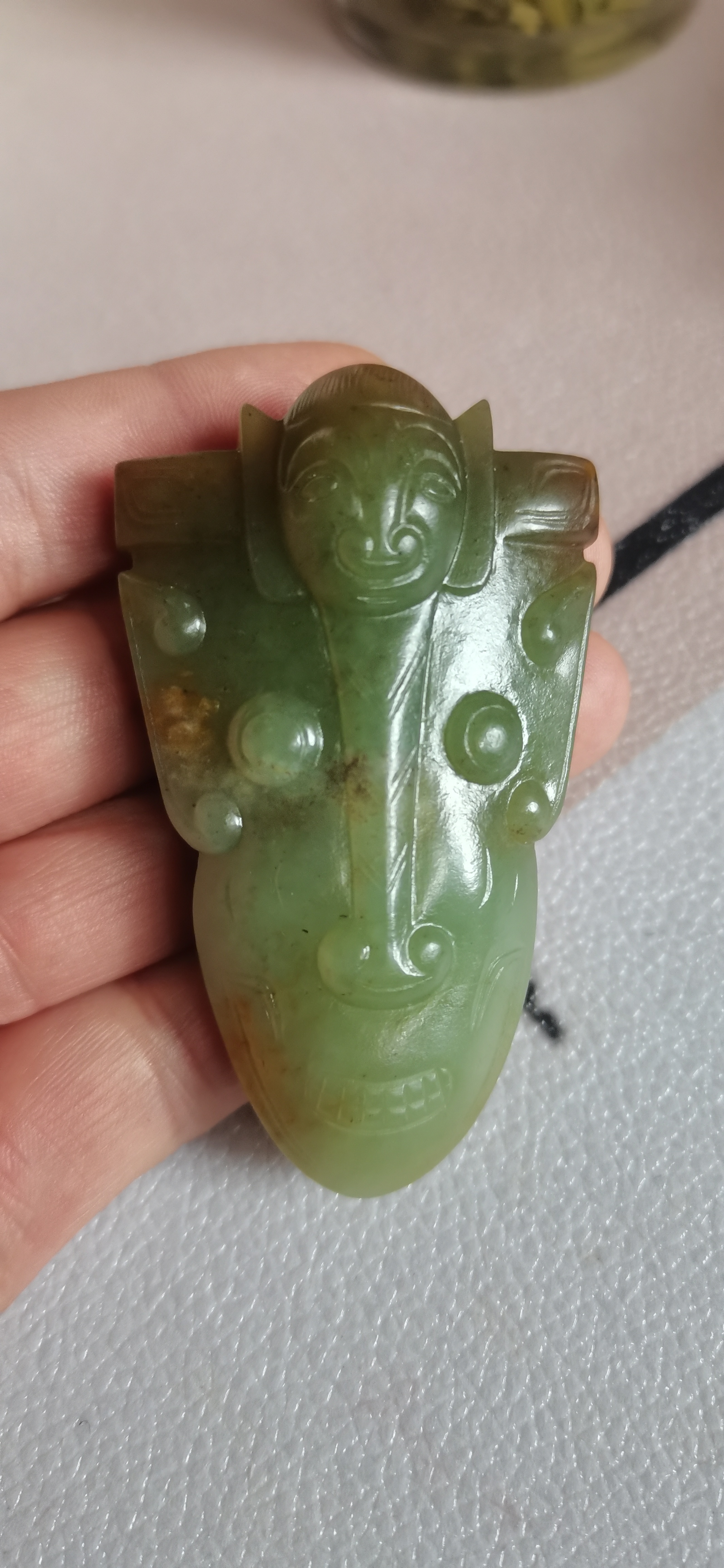 西周神人面玉佩